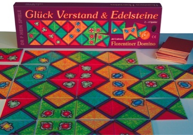 Ausgelegtes Spiel und Schachtel vom Florentiner Domino